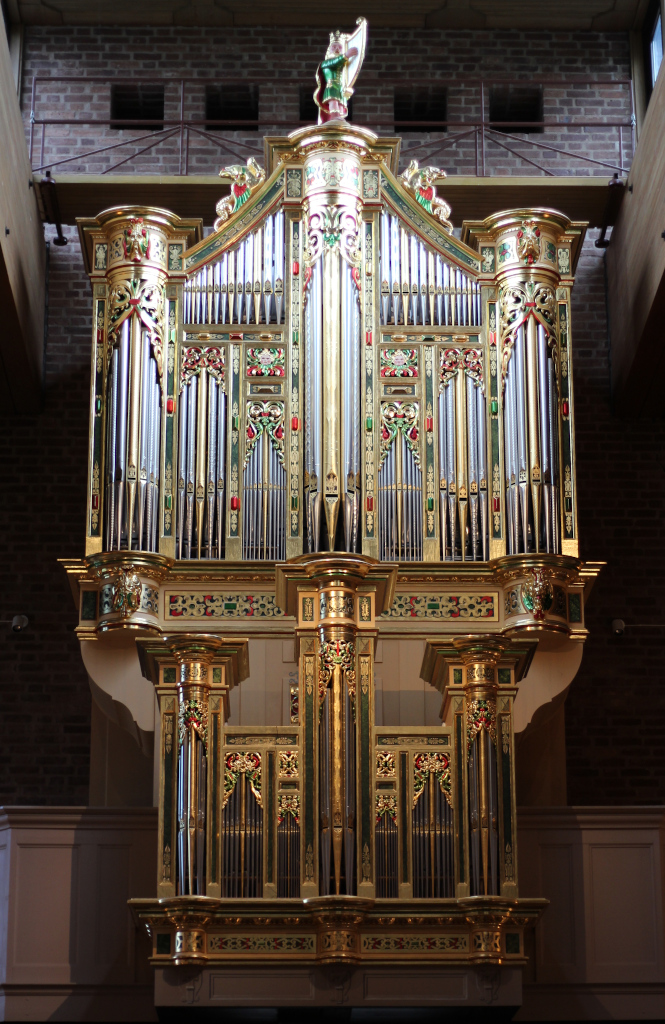 The extravagant golden facade of the baroque organ replica in Norrfjärden church.